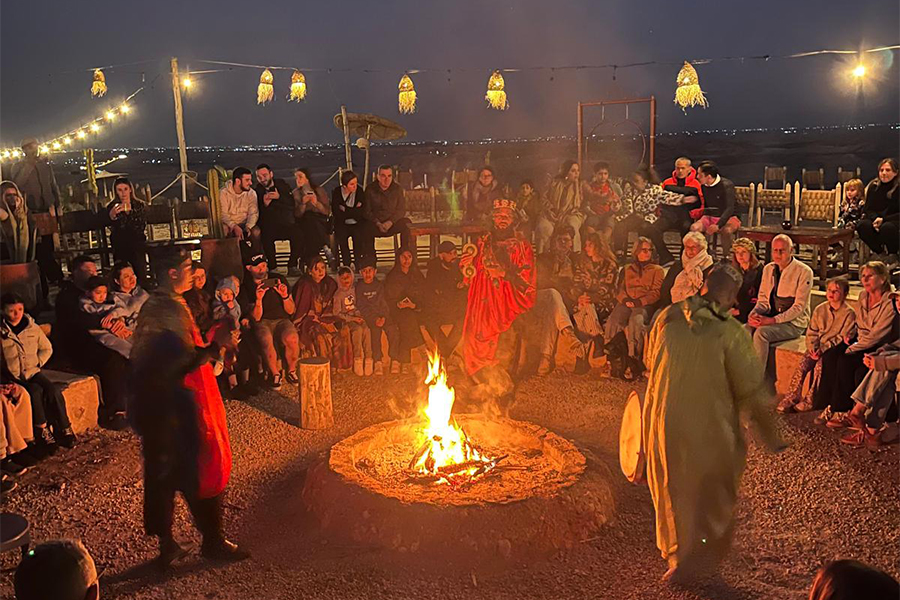 Traditional music and dance on camp fire in Agafay Desert, Morrocco