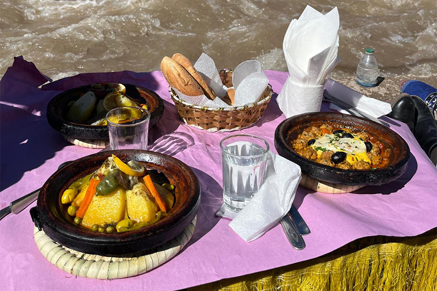 Deliciuos moroccan meal in a riverside restaurant in the Atlas mountains in Morocco
