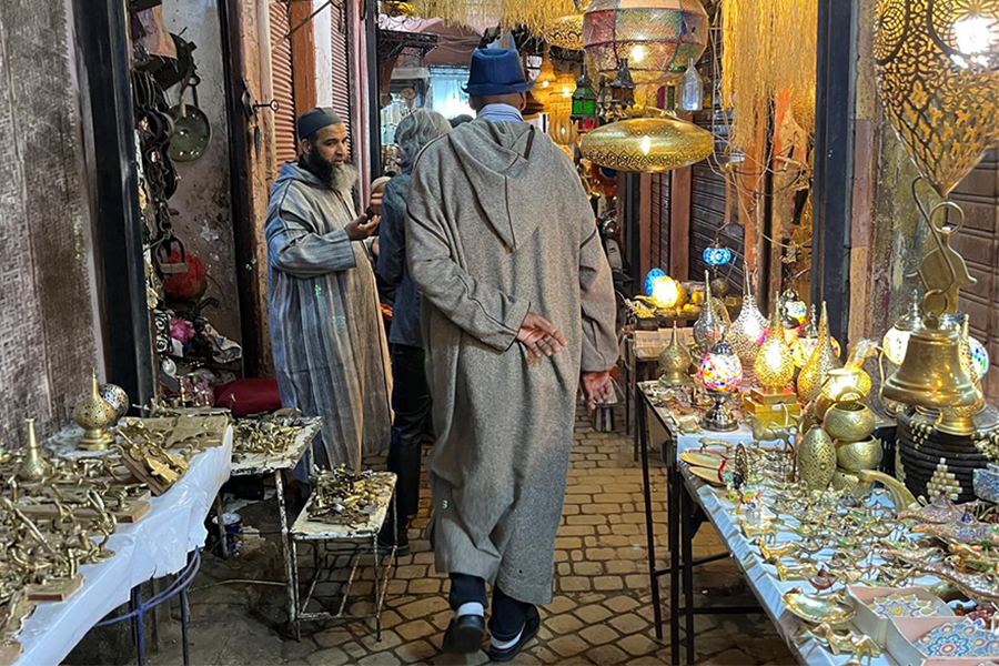 Small alley with shops at Souk in Marrakesh, Morocco